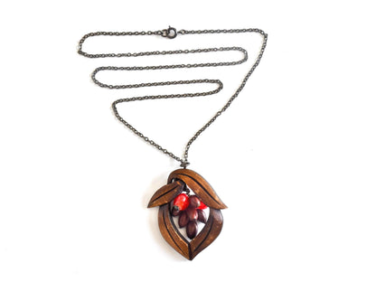 Oyama Tsuge wood necklace displayed flat with chain and pendant