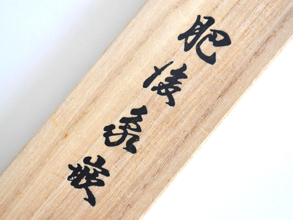 Higo Zogan diamond bamboo pendant necklace shown with Japanese calligraphy printed on the wooden box lid