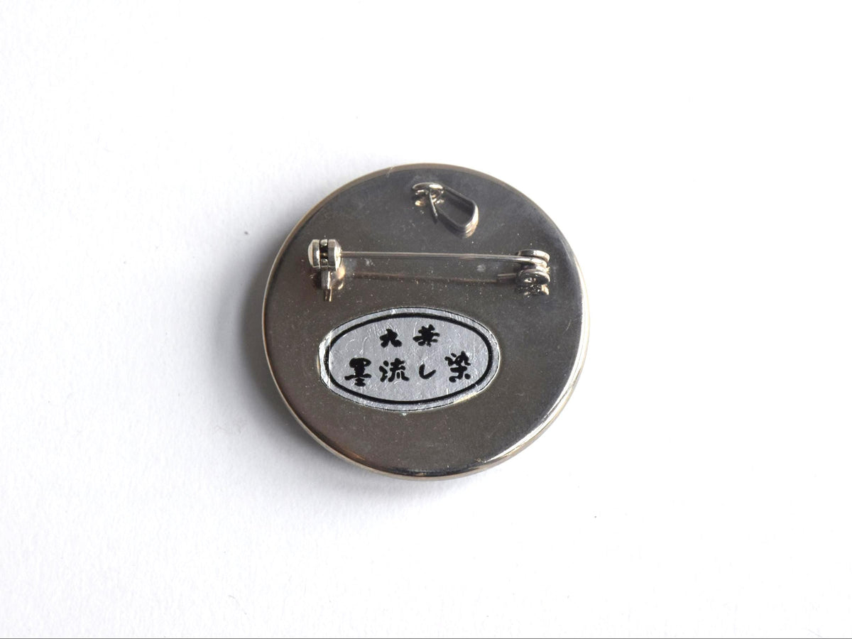 Suminagashizome marbled fabric brooch and pendant showing back with pin clasp and kanji signature