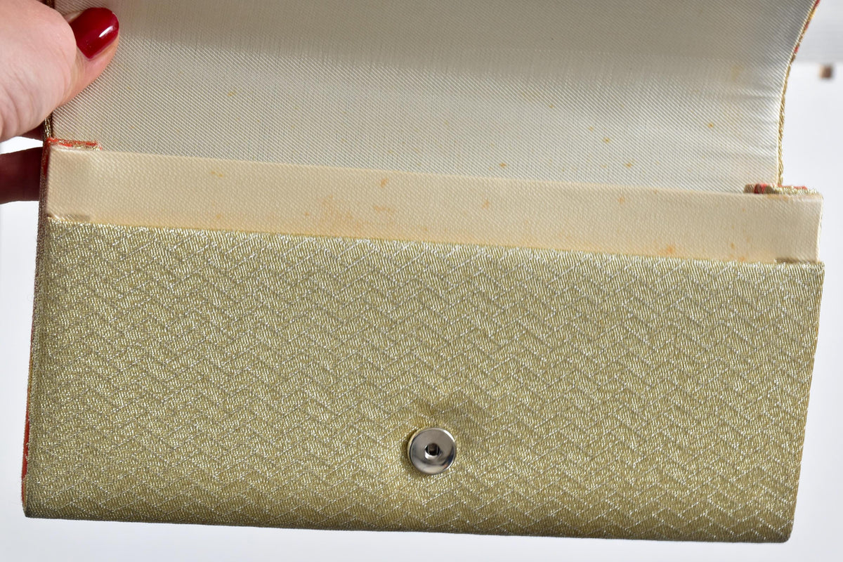 Japanese Obi Silk Clutch Seigaiha Gold And Red Wave showing inner lining age-related spotting