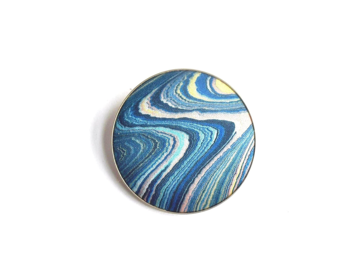 Suminagashizome marbled fabric brooch and pendant showing blue pink and yellow pattern