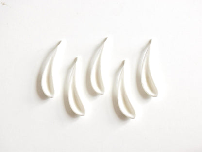 Kikyo Bellflower Porcelain Chopstick Rest Set showing the concave back and curved form of each piece