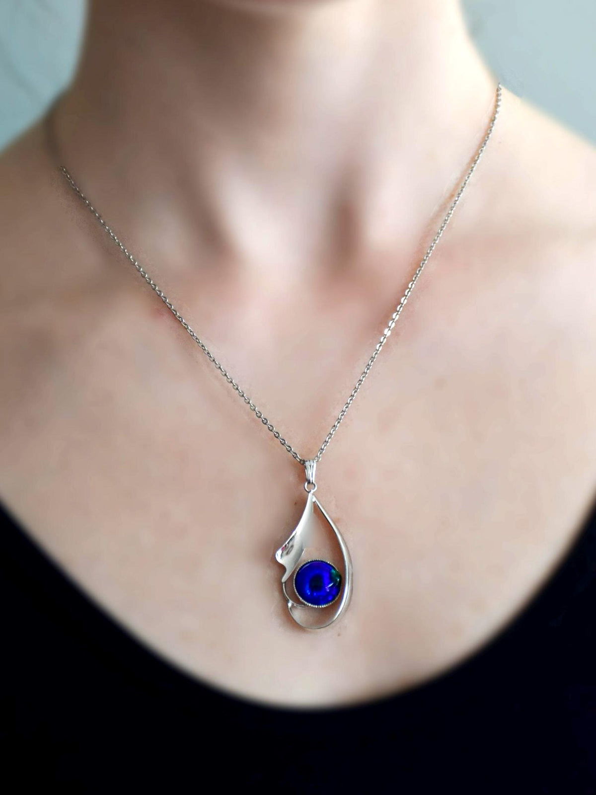 Japanese Oval Blue Pendant Necklace worn on a person