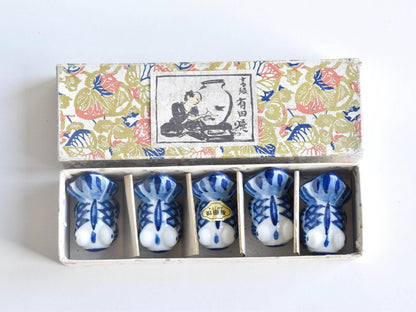 Arita-Yaki porcelain goldfish chopstick rest set displayed neatly inside its original illustrated decorative box