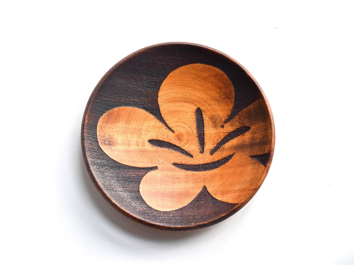 Kaga-Bori floral wooden tea saucer featuring a detailed view of the central engraved flower