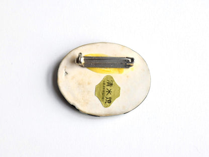 Kiyomizu-Yaki Iris Porcelain Brooch back showing metal pin and gold Kyoto origin sticker