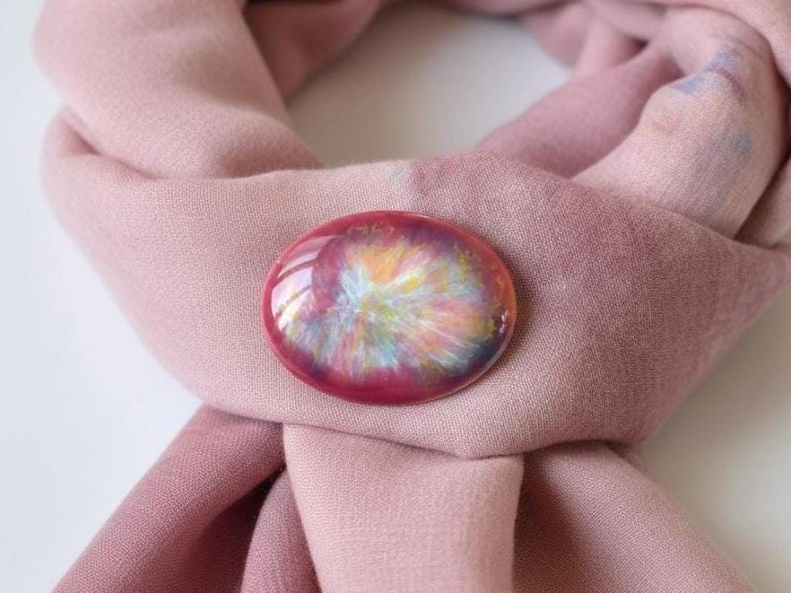 Kutani Ceramic Brooch Deep Blue And Purple Glaze pinned on a pink scarf