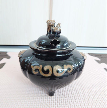 Kutani-Yaki Black Glaze Lion Finial Tripod Koro viewed from the front showing glossy black glaze