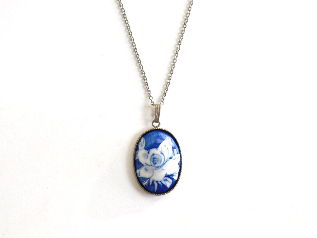 Japanese Cobalt Blue Floral Porcelain Pendant Necklace showing pendant front and silver-tone chain