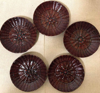 Rantai Shikki Woven Bamboo Lacquer Tray And Chataku Set five small plates arranged on a neutral surface