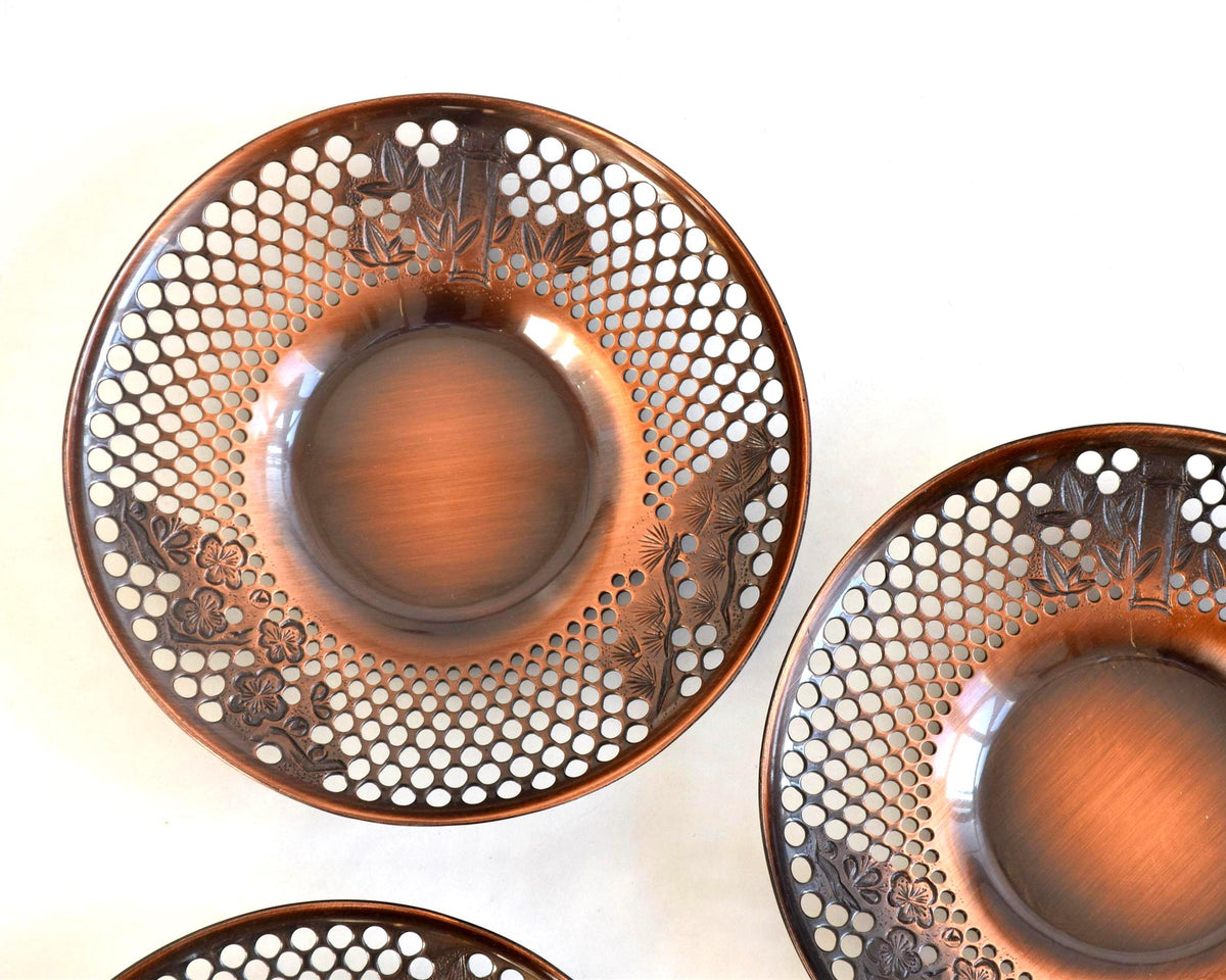 Pure Copper Sho-Chiku-Bai Openwork Tea Saucers top view highlighting the intricate pierced openwork and traditional motifs