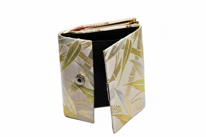 Nishijin-Ori bamboo leaf brocade coin purse gold green partially unfolded showing snap closure