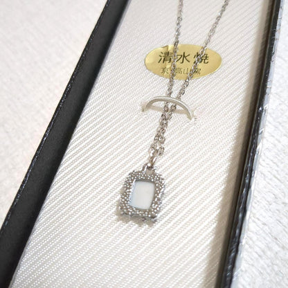 Kiyomizu-Yaki porcelain pendant cobalt white floral necklace showing plain back of pendant