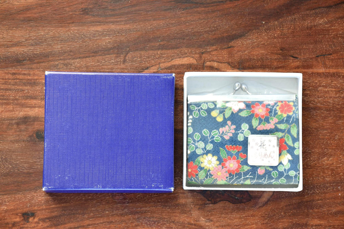 Navy Blue Floral Hana Chirimen Gamaguchi Coin Purse inside its open gift box with protective wrap and fabric label