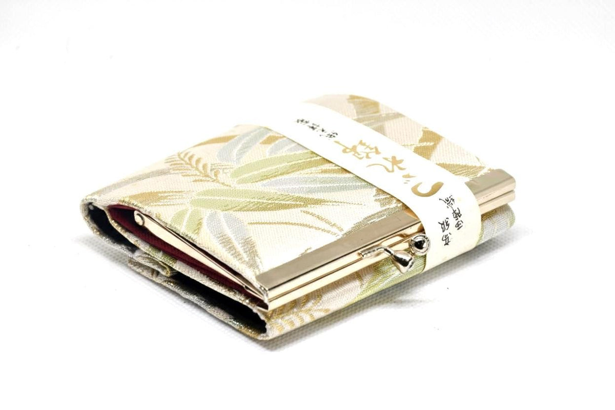 Nishijin-Ori bamboo leaf brocade coin purse gold green angled view on white background