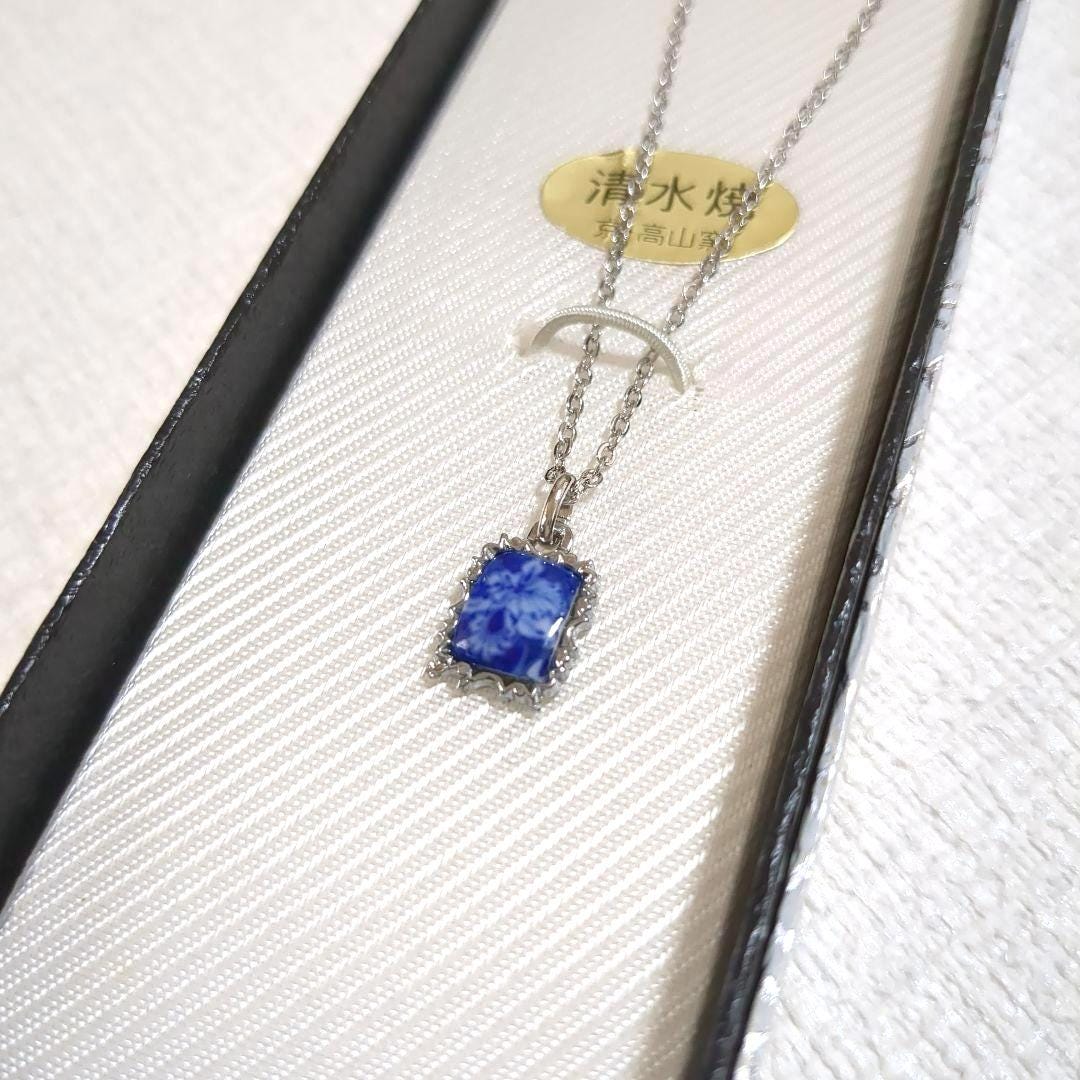 Kiyomizu-Yaki porcelain pendant cobalt white floral necklace showing back of pendant in box