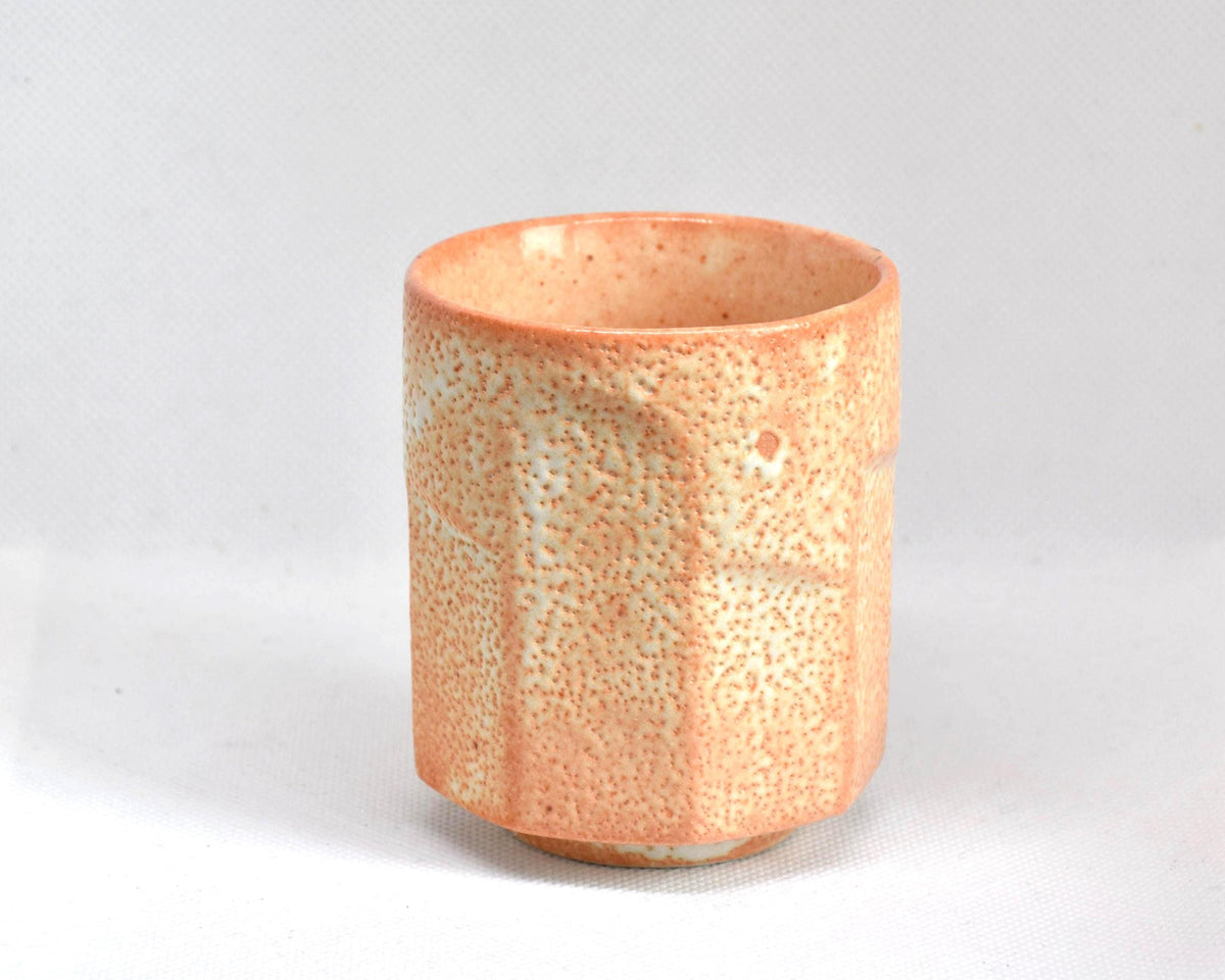 Shino-Yaki Yunomi tea cup showing the back side with flat sides