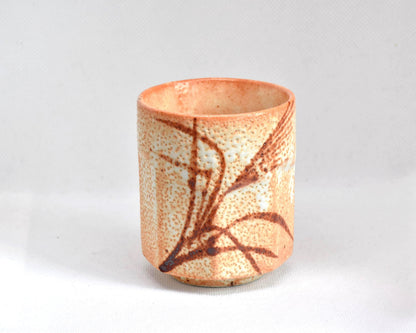 Shino-Yaki Yunomi tea cup featuring pattern detail and orange peel texture