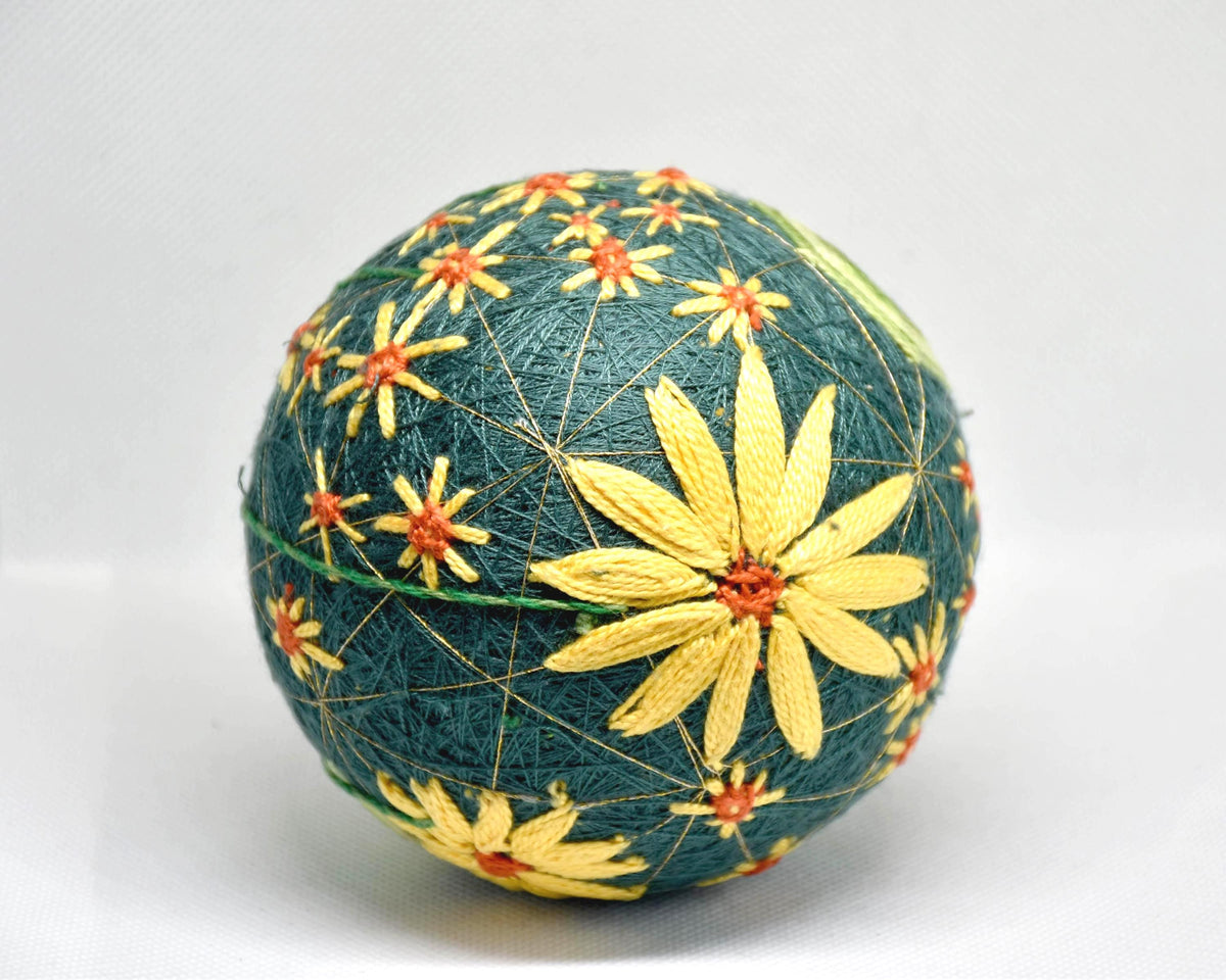 Temari Ball Hand Embroidery traditional folk art showing an alternate side view of the stitched flower pattern