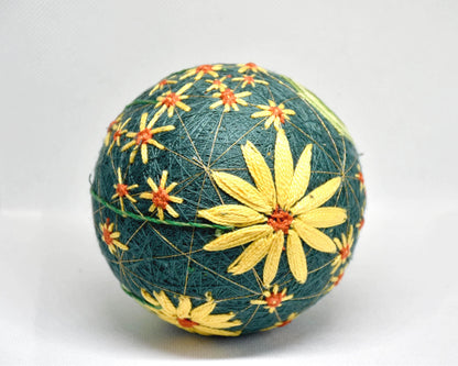 Temari Ball Hand Embroidery traditional folk art showing an alternate side view of the stitched flower pattern