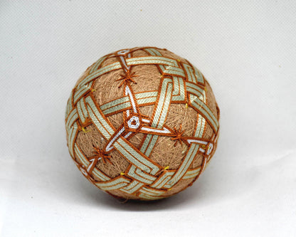 Hand-Embroidered Japanese Temari Ball Folk Art showing another angle of the intricate geometric embroidery.