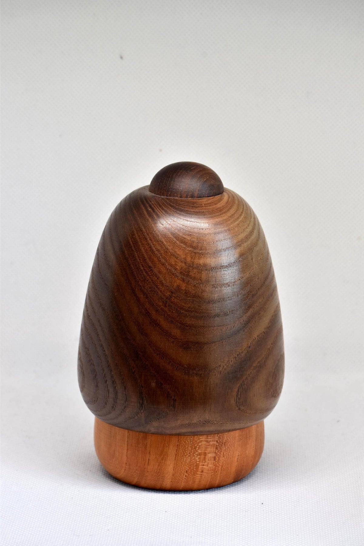 Daisuke Takeda Sosaku Kokeshi showing the curved back view of the doll with the bamboo pattern