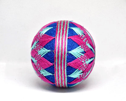 Hand-Embroidered Japanese Temari Ball side view showing decorative banded thread wrapping