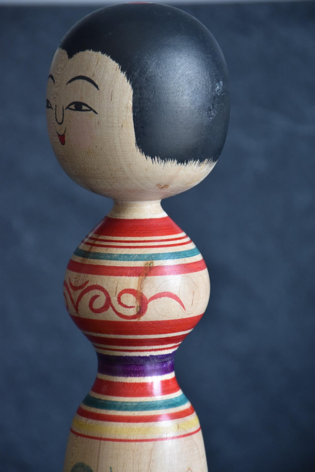 Senzo Mori kokeshi doll side face and upper body detail