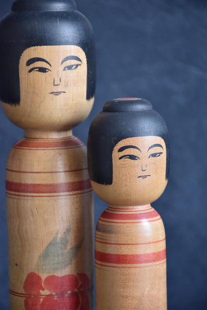 Zenji Sato Tsugaru kokeshi pair close up of hand painted facial features
