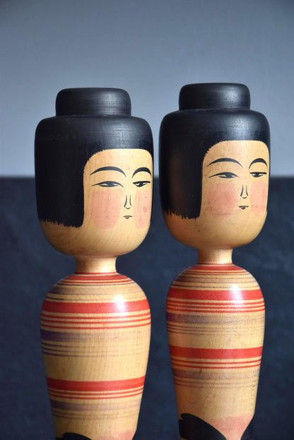 Zenji Sato kokeshi dolls close up of faces with serene expressions