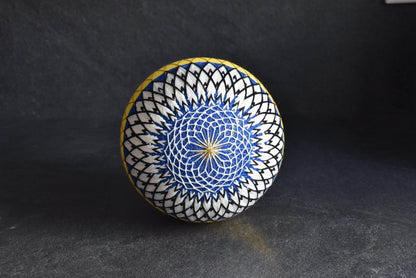 Geometric Black And White Embroidered Temari Ball showing intricate circular pattern detail