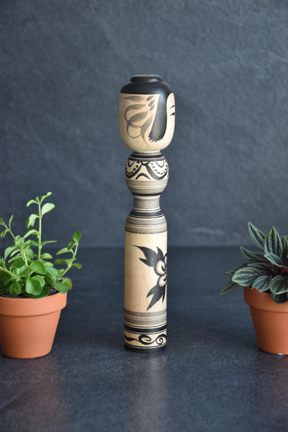 Zenji Sato kokeshi doll showing another angle of the side and profile
