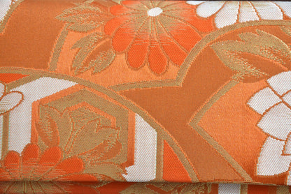 Saga Nishiki brocade clutch handbag detailed view of the traditional Japanese brocade fabric texture.