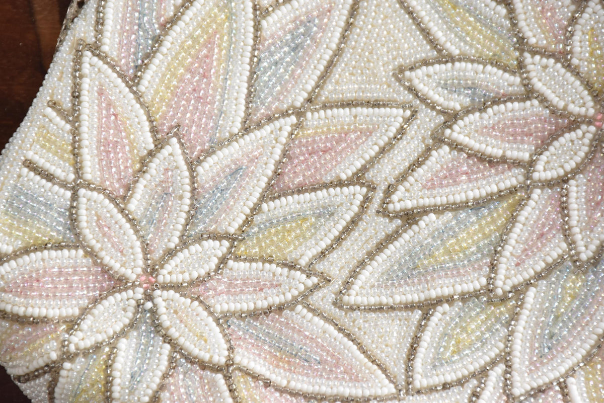 Vintage Japanese beaded clutch handbag macro shot of the uniform Japanese glass seed beads structure