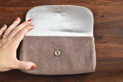 Japanese Floral Beaded Clutch In Lavender open to show the light lavender interior lining