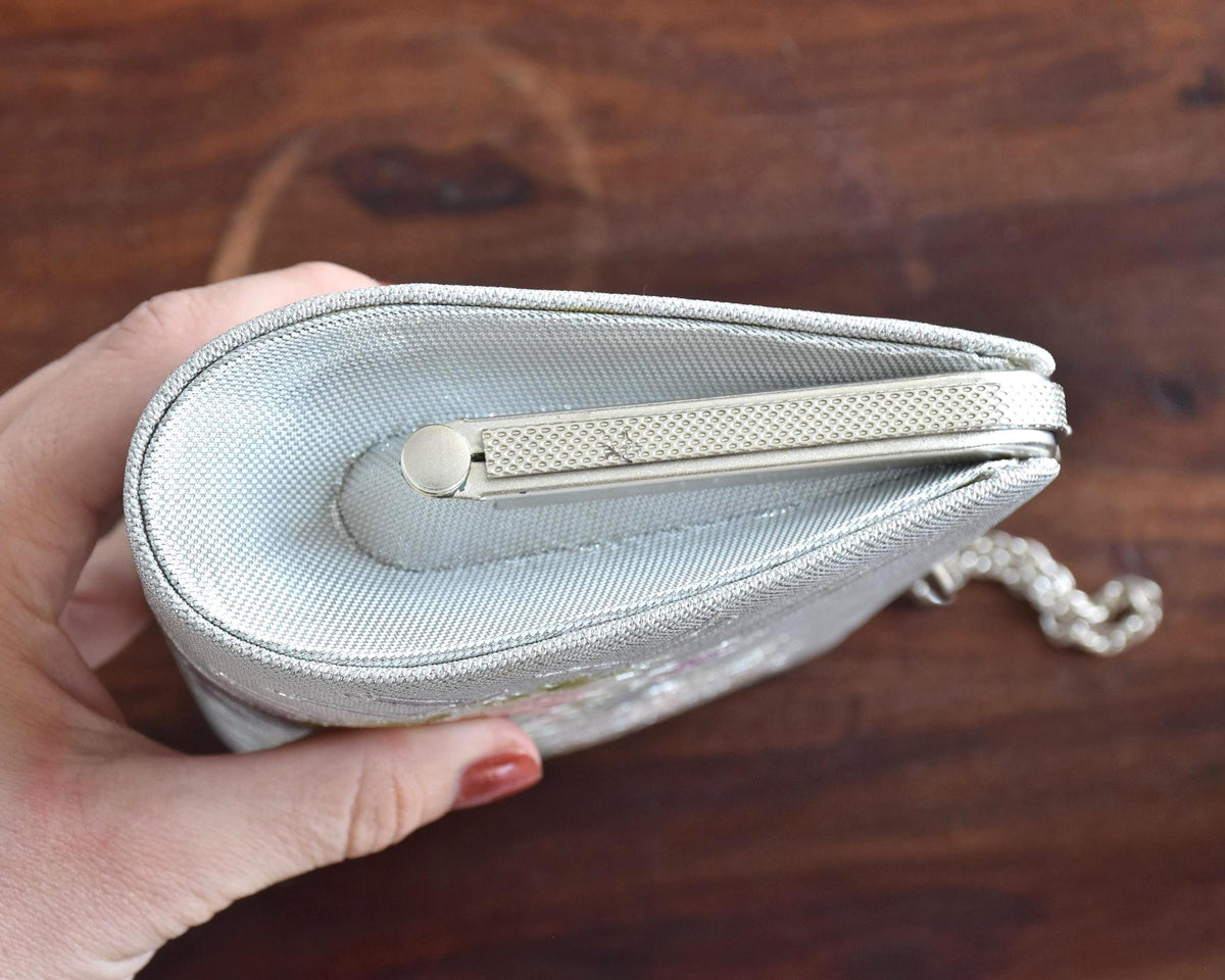 Japanese Floral Clutch With Raised Metallic Cord Detail showing the bottom base and side depth