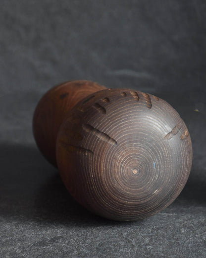 Sanpei Yamanaka kokeshi doll top view showing textured carved hair details