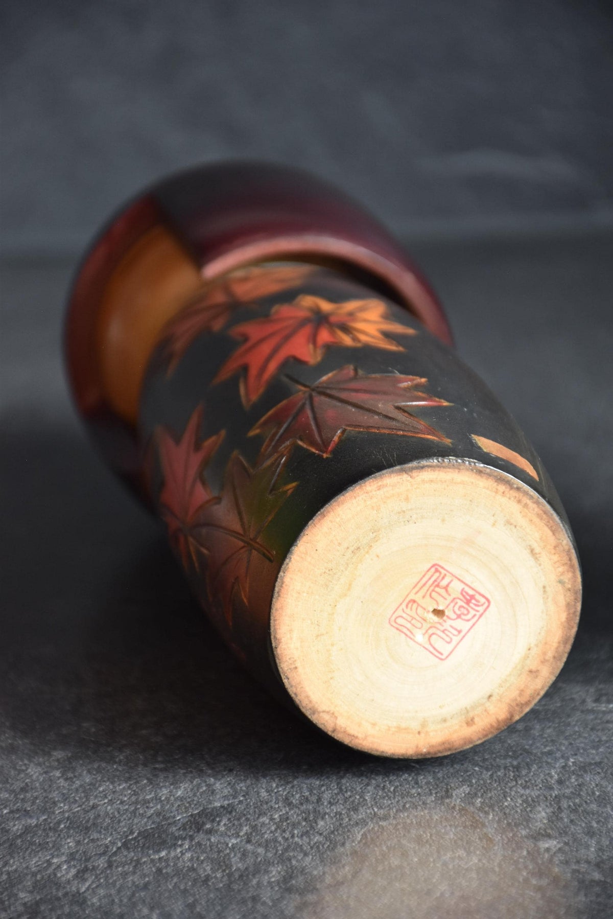 Kohji Sumiya kokeshi doll base with maker signature stamped in red ink