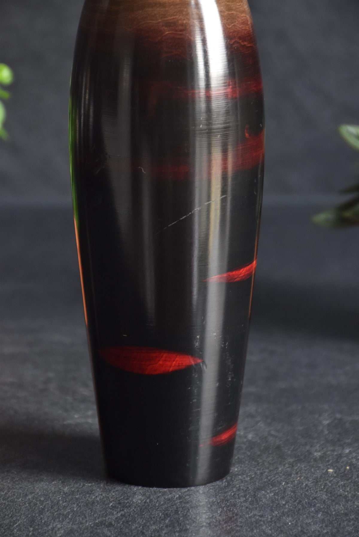 Masao Watanabe creative kokeshi doll body showing the red branch brushstroke patterns