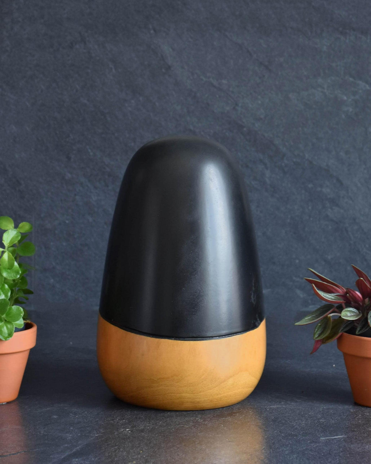 Ishimura Sosaku kokeshi doll showing side profile and minimalist face