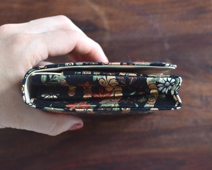 Japanese Clutch Maple Leaf And Floral Brocade held in hand showing depth