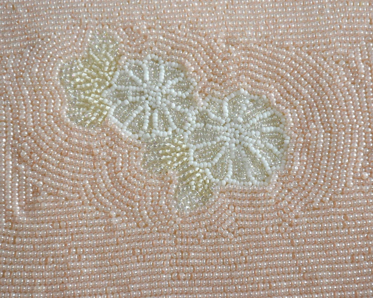 Japanese beaded clutch pattern detail of the pale cream flower motif
