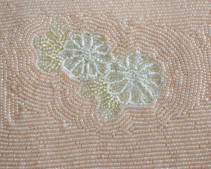 Japanese beaded clutch pattern detail of the pale cream flower motif