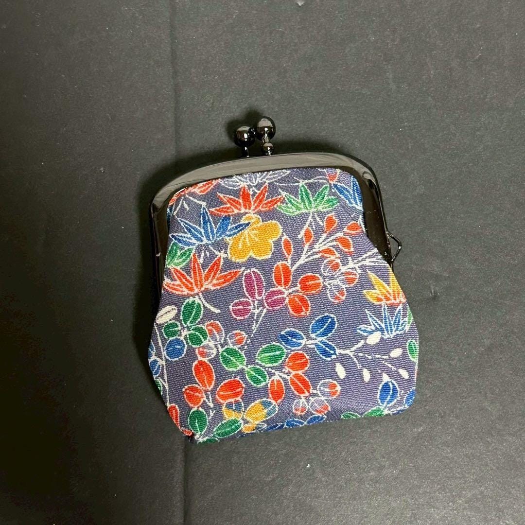 Kaga Yuzen Silk Gamaguchi Coin Purse close up of the vibrant floral and leaf silk textile pattern