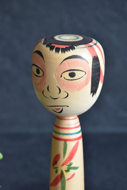 Fumio Kakizaki kokeshi close-up of facial expression and detailed painted features