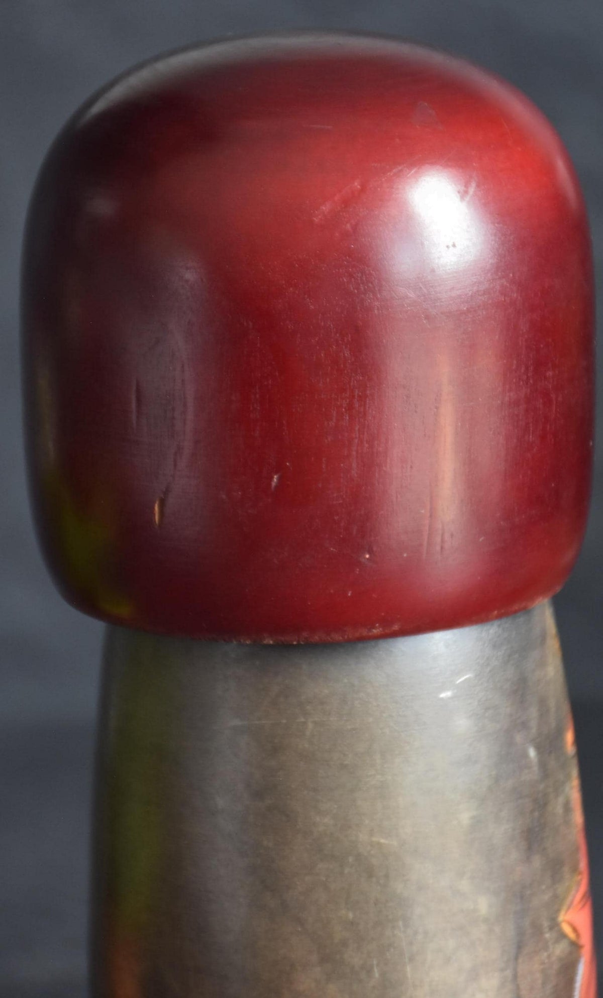 Kohji Sumiya kokeshi doll closeup of minor wear on the auburn head