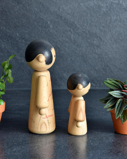 Hideo Ishihara kokeshi pair angled view