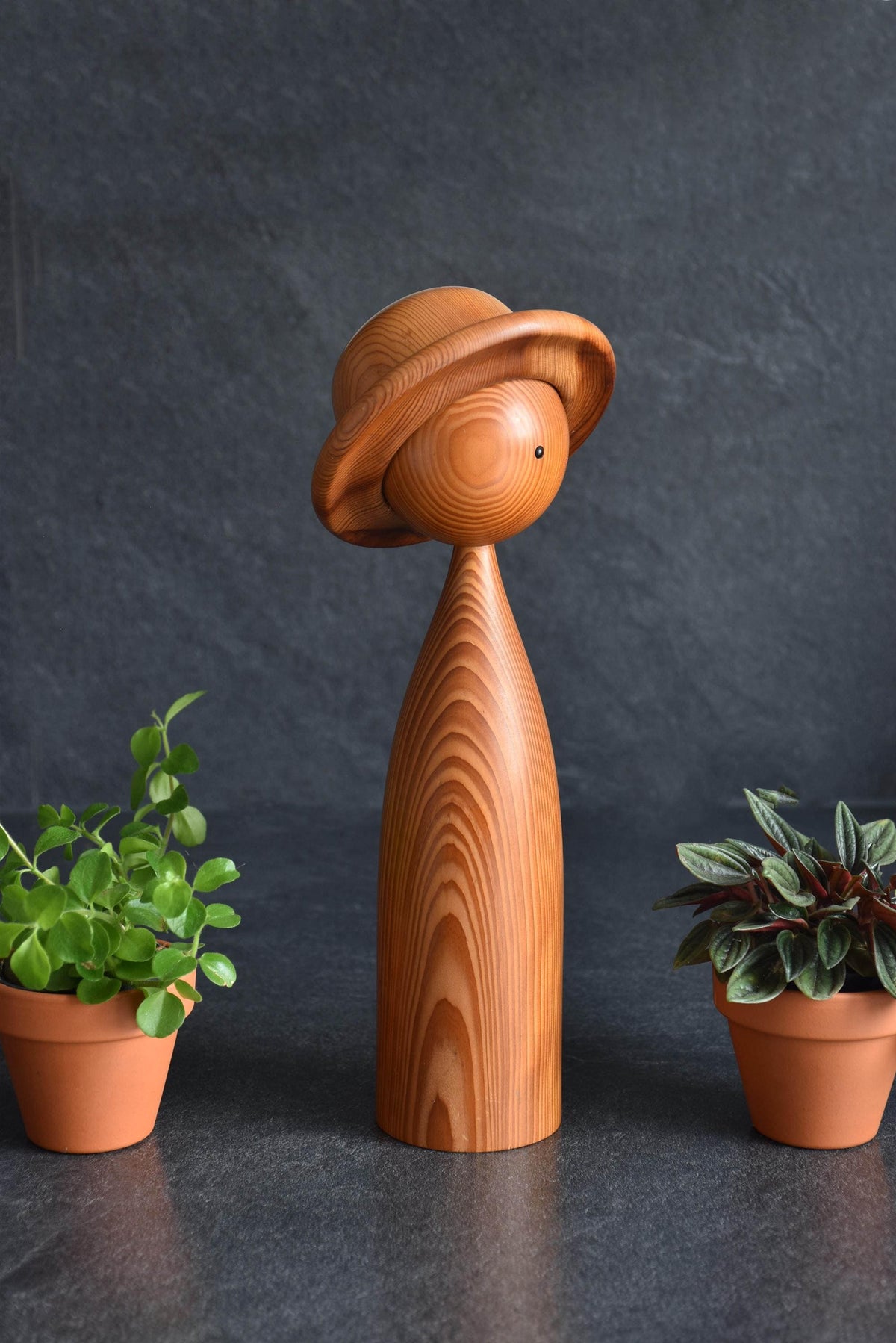 Sosaku Kokeshi doll in Yakusugi cedar wood shown from the front view