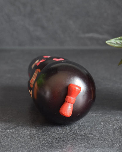 Sosaku Kokeshi Doll Hajime Miyashita top view featuring the red hair bow