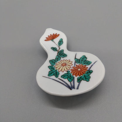 Floral Gourd Porcelain Chopstick Rest single piece viewed closely from the front